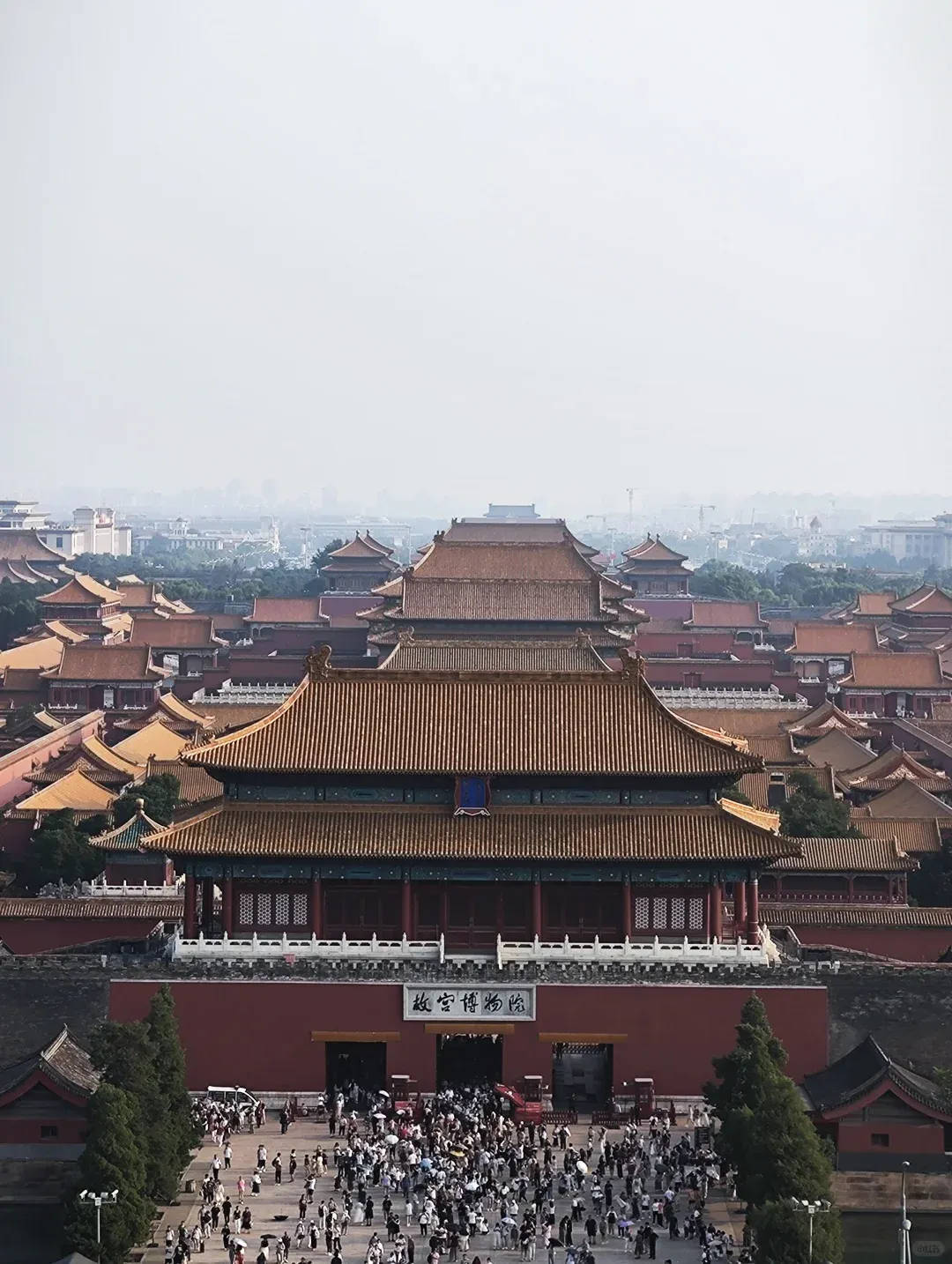 View over the Forbidden City's golden rooftops from the hilltop pavilion in Jingshan Park