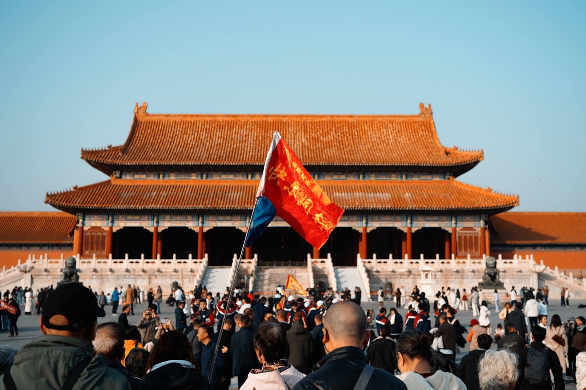 Tour-group crowds at the Forbidden City — daily caps fill fast and walk-up tickets rarely happen